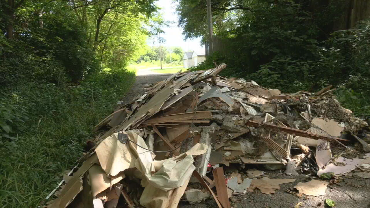 Pile of illegally dumped materials off N. 34th Street in Louisville's Portland neighborhood